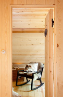 View into wooden bedroom