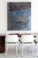 Modern dining room with painting by Ena Swansea