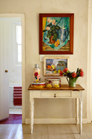 Colourful art and accessories in hallway