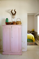 Pink cupboard in hall