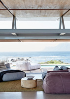 Contemporary living room overlooking sea