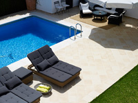Loungers by pool