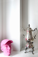 Modern sculpture and ornate teapot
