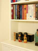 Oriental ornaments on bookcase