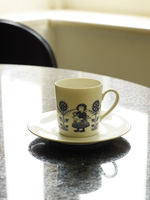 Patterned cup on kitchen table