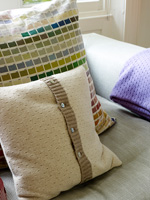Patterned cushions on sofa