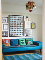 Blue sofa with colourful cushions