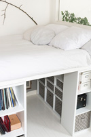 White bedroom with storage under bed