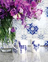 Patterned tableware on kitchen counter