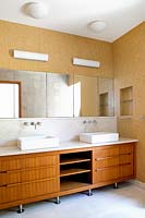 Sinks on wooden cabinet