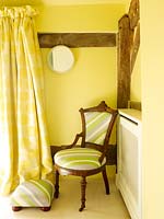 Vintage chair in bedroom corner