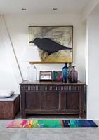 Modern painting and vintage furniture