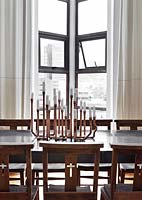 Metal candelabra on dining table