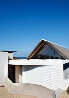 Modern white house by the sea