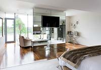 Contemporary bedroom suite with seating area