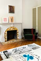 Marble fireplace and modern art