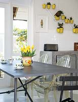 Patterned crockery on modern dining table