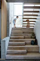 Boy and dog on stairs