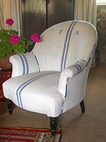 Armchair upholstered in vintage fabric