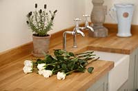 Roses on kitchen counter