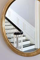 Classic staircase reflected in mirror
