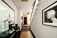 Black and white photography in entrance hall