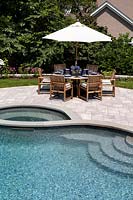 Patio by swimming pool
