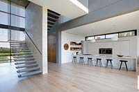 Contemporary open plan stairs and kitchen