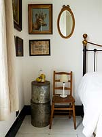 Wooden chair used as bedside table
