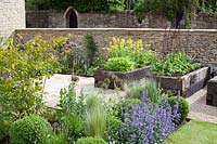 Colourful garden with raised vegetable beds