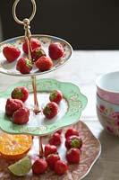 Strawberries on patterned cake stand