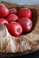 Apples in rustic wooden bowl