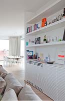 Shelving units in modern open plan apartment