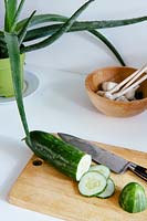 Cucumber on chopping board