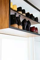 Shoe storage above doorway