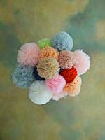 Pompoms hanging from ceiling