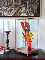 Lobster sculpture in glass case