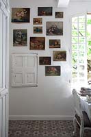 Floral paintings on kitchen wall