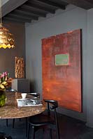 Abstract painting in dining room