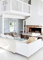 White living room with mezzanine