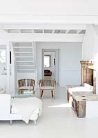 White living room with staircase