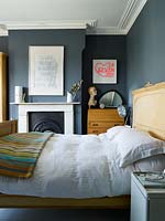 Modern bedroom with vintage furniture