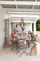 Family eating on their veranda