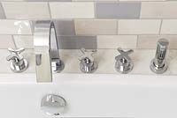 Modern taps by bath