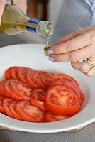 Making a tomato salad
