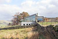 Stone and glass house in rural setting