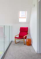 Red armchair on mezzanine