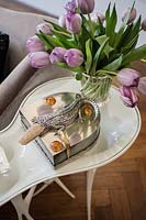 Silver accessory on white coffee table