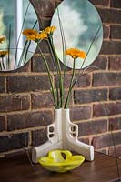 Gerbera flowers in sculptural vase
