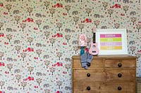 Patterned wallpaper in childs bedroom
